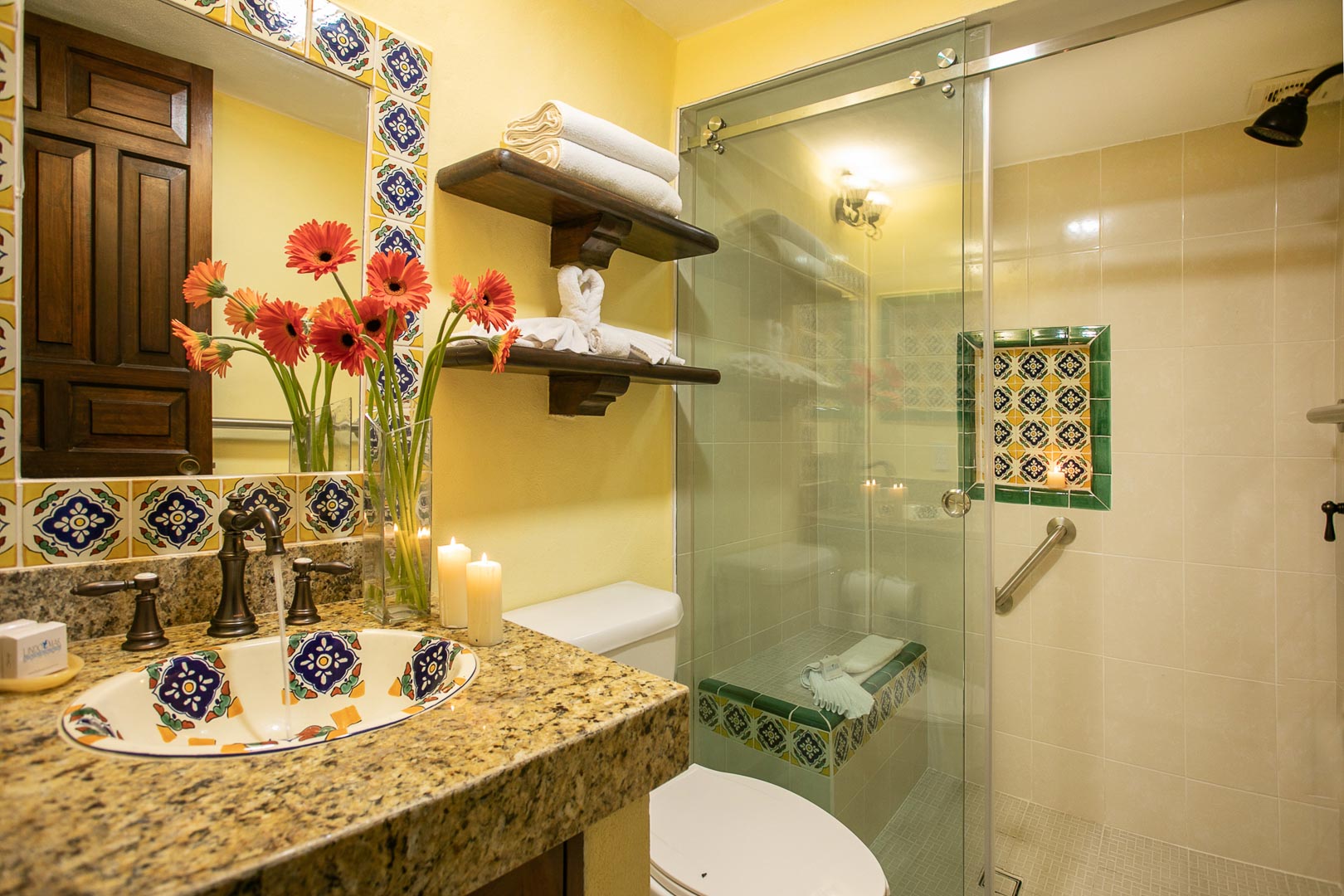 a clean bathroom with a walk-in shower at TPI's Lindo Mar Resort in Puerto Vallarta, Mexico.